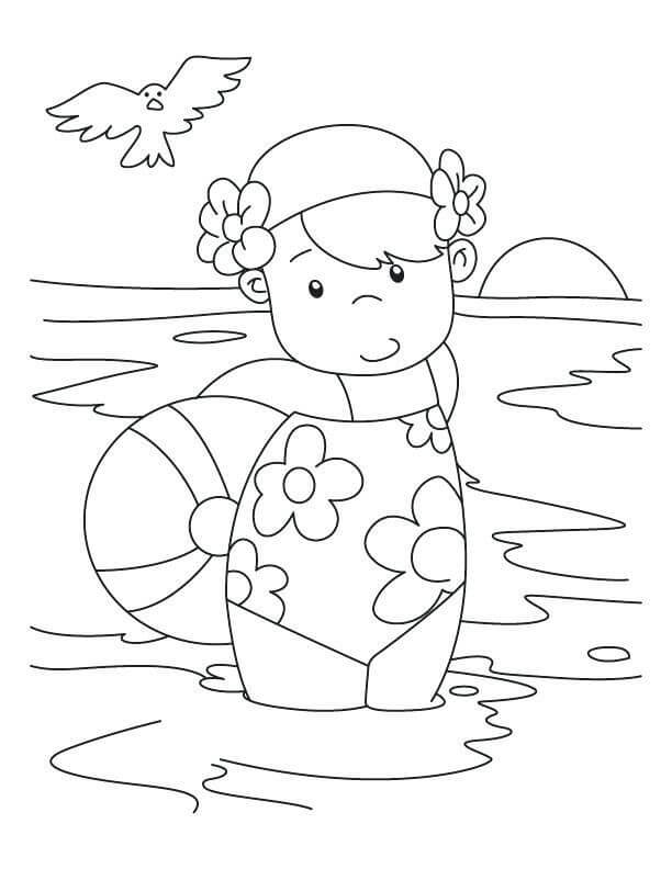 해변에서 수영하는 어린 소녀